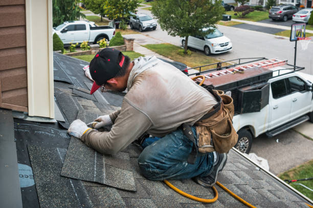 Professional Roofing technician working in Bruington, VA